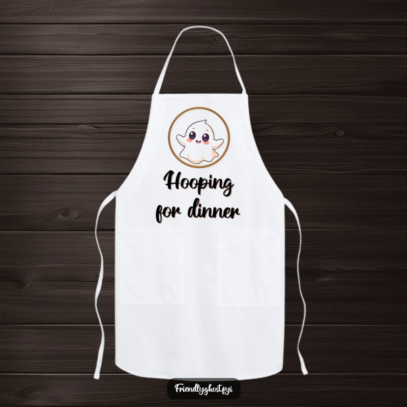 Funny apron with a giggling ghost with big eyes gently floating through a hoop, designed for a playful cooking experience.