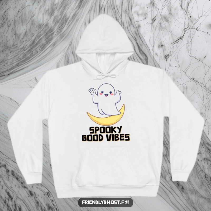 Funny hoodie with a cute ghost giving a friendly wave from a radiant crescent moon, ideal for cozy, spooky, and humorous occasions.