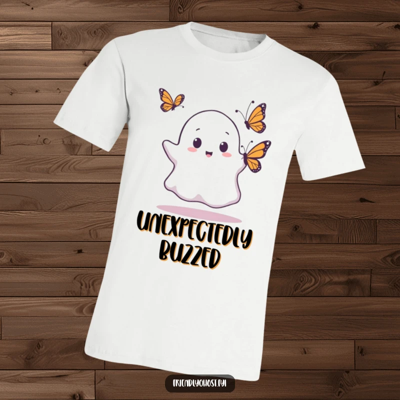 Funny t-shirt with a ghost looking surprised as a butterfly lands on it, a humorous and charming design for all.