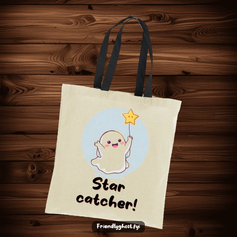 Funny Ghost Star Tote Bag: Spacious bag featuring a ghost joyfully catching a falling star, perfect for carrying items with celestial humor.